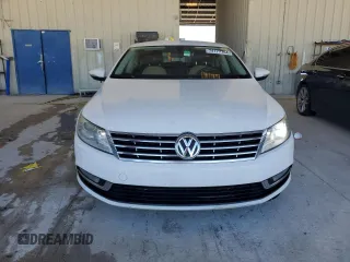 2014 Volkswagen CC R-Line with VIN WVWBP7AN6EE521807, listed as a Copart auction lot 74177764 with 142,779 mi miles and Clean Title. Bid and sale history available at carsss.com. Image 5.