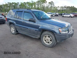 2004 Jeep Grand Cherokee Laredo with VIN 1J4GW48S24C101792, listed as a IAAI auction lot 41995351 with 138,317 mi miles. Bid and sale history available at carsss.com. Image 1.