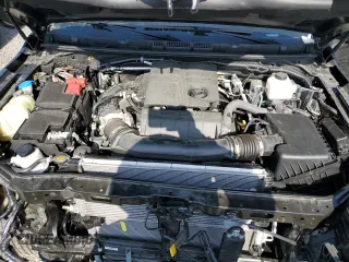 2023 Nissan Frontier Pro-4X z VIN 1N6ED1EK8PN674868, wystawiony jako Copart lot #50262715 z przebiegiem 13 545 mil mil oraz Szkoda całkowita • Salvage title. Historia ofert i sprzedaży dostępna na DreamBid. Obrazek 11.