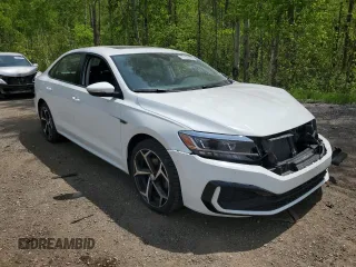 2020 Volkswagen Passat with VIN 1VWEA7A32LC004720, listed as a Copart auction lot 57310295 with 125,589 mi miles and Salvage title. Bid and sale history available at DreamBid. Image 4.