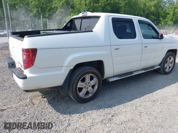 2010 Honda Ridgeline RTL with VIN 5FPYK1F58AB012526, listed as a IAAI auction lot 42421618 with 258,727 mi miles and . Bid and sale history available at DreamBid. Image 4.