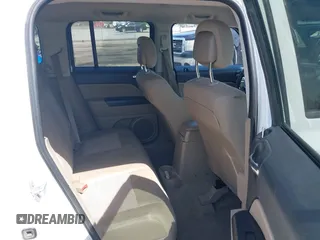 2014 Jeep Patriot Sport with VIN 1C4NJPBB3ED618570, listed as a IAAI auction lot 42126639 with 157,005 mi miles and . Bid and sale history available at DreamBid. Image 8.