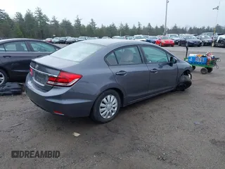 2014 Honda Civic Sedan LX with VIN 2HGFB2F53EH541941, listed as a IAAI auction lot 42033294 with 104,006 mi miles. Bid and sale history available at carsss.com. Image 4.