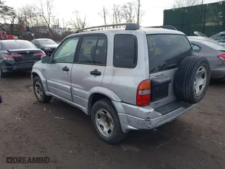 2002 Suzuki Grand Vitara JLX with VIN JS3TD62V724153257, listed as a IAAI auction lot 41452635 with 999,999 mi miles. Bid and sale history available at carsss.com. Image 3.