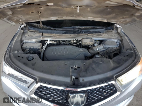 2017 Acura MDX with VIN 5FRYD3H31HB010863, listed as a Copart auction lot 63474185 with 99,706 mi miles and Salvage title. Bid and sale history available at DreamBid. Image 12.