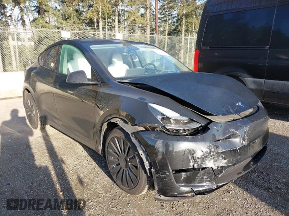 2023 Tesla Model Y Long Range z VIN 7SAYGDEE9PF637042, wystawiony jako IAAI lot #41969086 z przebiegiem 25 524 mil mil oraz . Historia ofert i sprzedaży dostępna na DreamBid. Obrazek 1.