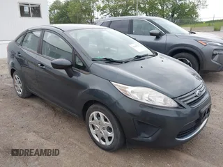 2011 Ford Fiesta S with VIN 3FADP4AJ3BM227426, listed as a IAAI auction lot 42330733 with 89,524 mi miles and . Bid and sale history available at DreamBid. Image 1.