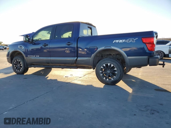 2016 Nissan Titan XD PRO-4X with VIN 1N6BA1F40GN515886, listed as a Copart auction lot 80798594 with 172,004 mi miles and Clean Title. Bid and sale history available at carsss.com. Image 2.