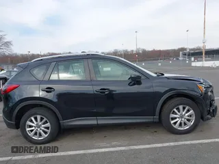 2016 Mazda CX-5 Sport with VIN JM3KE4BY7G0893578, listed as a IAAI auction lot 41853840 with 95,937 mi miles. Bid and sale history available at carsss.com. Image 13.