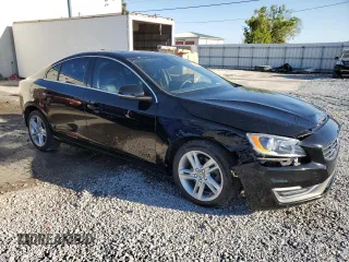 2015 Volvo S60 T5 Drive-E Premier with VIN YV140MFK4F2338462, listed as a Copart auction lot 48485665 with 57,695 mi miles and Salvage title. Bid and sale history available at DreamBid. Image 4.