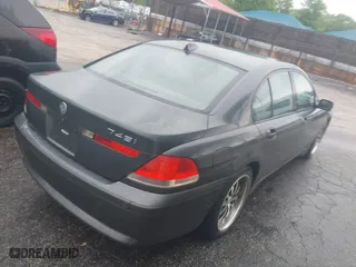 2004 BMW 7 Series 745i with VIN WBAGL63444DP70043, listed as a IAAI auction lot 41982697 with 188,931 mi miles. Bid and sale history available at carsss.com. Image 4.