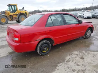 2000 Mazda Protege DX with VIN JM1BJ2224Y0277889, listed as a IAAI auction lot 41160593 with 124,586 mi miles and . Bid and sale history available at DreamBid. Image 4.