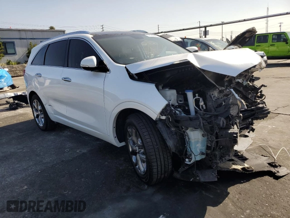 2017 Kia Sorento SXL z VIN 5XYPK4A54HG250891, wystawiony jako Copart lot #57791565 z przebiegiem Nie podano mil oraz Szkoda całkowita • Salvage title. Historia ofert i sprzedaży dostępna na DreamBid. Obrazek 4.