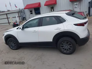 2022 Mazda CX-30 S with VIN 3MVDMBALXNM422418, listed as a IAAI auction lot 41531552 with 21,909 mi miles and . Bid and sale history available at carsss.com. Image 14.