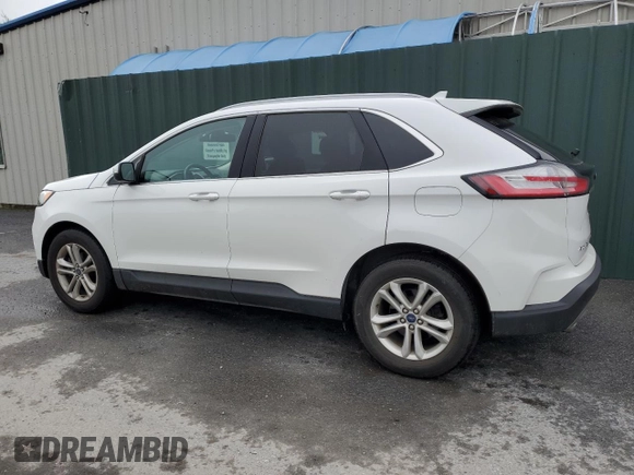 2020 Ford Edge SEL z VIN 2FMPK3J90LBB01559, wystawiony jako Copart lot #61365305 z przebiegiem 120 050 mil mil oraz Czysty tytuł • Clean title. Historia ofert i sprzedaży dostępna na DreamBid. Obrazek 2.
