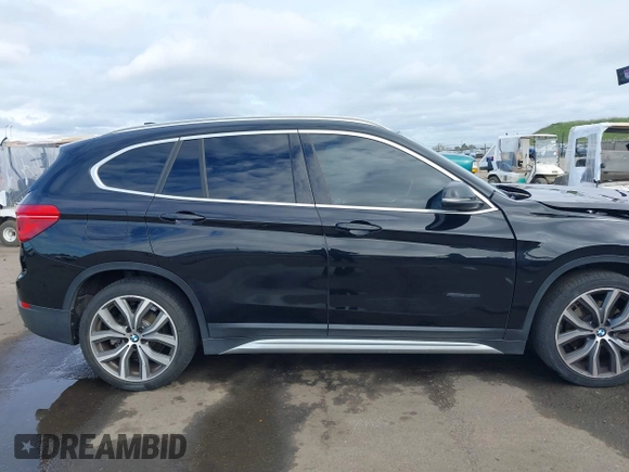 2017 BMW X1 sDrive28i with VIN WBXHU7C3XHP924635, listed as a IAAI auction lot 41744824 with 74,143 mi miles. Bid and sale history available at carsss.com. Image 13.