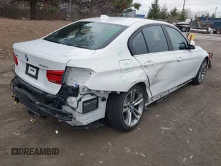 2017 BMW 3 Series 330i xDrive with VIN WBA8D9C36HA005515, listed as a IAAI auction lot 41853555 with 65,265 mi miles and . Bid and sale history available at DreamBid. Image 4.