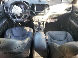 2019 Jeep Cherokee High Altitude with VIN 1C4PJMDX4KD133124, listed as a Copart auction lot 55817625 with 76,621 mi miles and Salvage title. Bid and sale history available at DreamBid. Image 8.