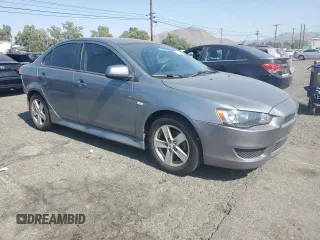 2014 Mitsubishi Lancer SE z VIN JA32V2FW3EU021070, wystawiony jako Copart lot #58239705 z przebiegiem 120 060 mil mil oraz Szkoda całkowita • Salvage title. Historia ofert i sprzedaży dostępna na DreamBid. Obrazek 4.