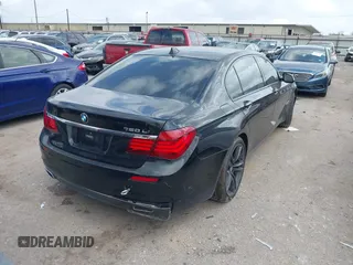 2013 BMW 7 Series 750Li with VIN WBAYE8C55DD133178, listed as a IAAI auction lot 41509860 with 90,841 mi miles and . Bid and sale history available at DreamBid. Image 4.