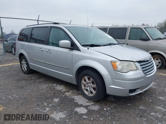 2010 Chrysler Town & Country Touring z VIN 2A4RR5D12AR265985, wystawiony jako IAAI lot #41970445 z przebiegiem 125 635 mil mil oraz . Historia ofert i sprzedaży dostępna na DreamBid. Obrazek 1.