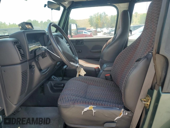 2000 Jeep Wrangler Sport с VIN 1J4FA49S4YP710633, выставлен на аукционе Copart как лот 65095875 с пробегом 107 613 миль миль и Чистый • Clean title. История ставок и продаж доступна на DreamBid. Изображение 7.