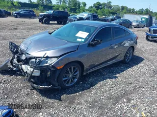 2020 Honda Civic EX-L with VIN 19XFC1F71LE201736, listed as a IAAI auction lot 39805242 with 47,132 mi miles and . Bid and sale history available at DreamBid. Image 2.