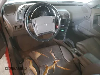1990 Chrysler LeBaron z VIN 1C3XJ45J9LG405682, wystawiony jako Copart lot #48690985 z przebiegiem 75 714 mil mil oraz Tytuł czysty. Historia ofert i sprzedaży dostępna na DreamBid. Obrazek 8.