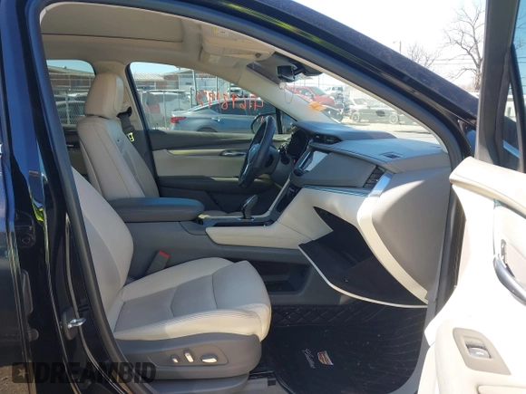 2017 Cadillac XT5 Premium Luxury FWD z VIN 1GYKNCRS8HZ127001, wystawiony jako IAAI lot #41698197 z przebiegiem 120 978 mil mil oraz . Historia ofert i sprzedaży dostępna na DreamBid. Obrazek 5.