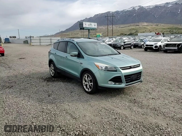 2013 Ford Escape Titanium с VIN 1FMCU9J94DUC35451, выставлен на аукционе Copart как лот 54412335 с пробегом 187 938 миль миль и Списание • Salvage title. История ставок и продаж доступна на DreamBid. Изображение 14.