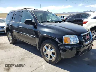 2005 GMC Envoy SLE z VIN 1GKDT13S752390266, wystawiony jako Copart lot #50766935 z przebiegiem 115 225 mil mil oraz Szkoda całkowita • Salvage title. Historia ofert i sprzedaży dostępna na DreamBid. Obrazek 4.