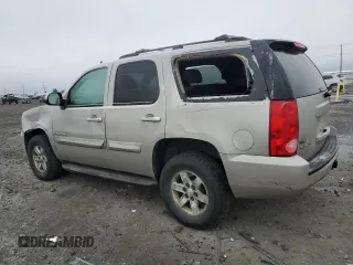 2009 GMC Yukon SLE w/3SB with VIN 1GKFK23039R224372, listed as a Copart auction lot 87762195 with 160,893 mi miles and Salvage Title. Bid and sale history available at carsss.com. Image 2.