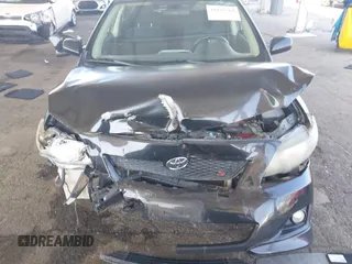 2010 Toyota Corolla with VIN 2T1BU4EE3AC419928, listed as a IAAI auction lot 41976564 with 143,075 mi miles. Bid and sale history available at carsss.com. Image 6.