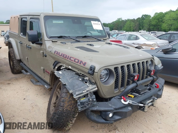 2020 Jeep Gladiator Rubicon z VIN 1C6JJTBG6LL179541, wystawiony jako IAAI lot #42050510 z przebiegiem 52 784 mil mil oraz . Historia ofert i sprzedaży dostępna na DreamBid. Obrazek 1.