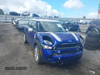 2016 MINI Countryman S with VIN WMWZC3C55GWP53633, listed as a IAAI auction lot 42526582 with 58,898 mi miles and . Bid and sale history available at DreamBid. Image 1.