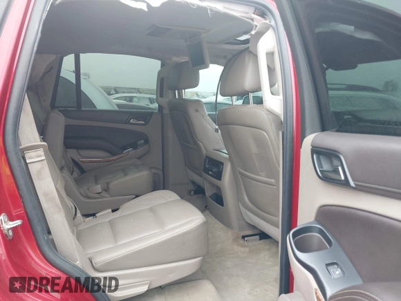 2015 Chevrolet Tahoe LTZ z VIN 1GNSKCKC6FR276531, wystawiony jako IAAI lot #41692617 z przebiegiem 124 010 mil mil oraz . Historia ofert i sprzedaży dostępna na DreamBid. Obrazek 8.