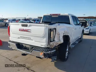 2021 GMC Sierra 1500 SLT z VIN 3GTU9DED5MG123692, wystawiony jako IAAI lot #41229854 z przebiegiem 84 651 mil mil oraz . Historia ofert i sprzedaży dostępna na DreamBid. Obrazek 6.