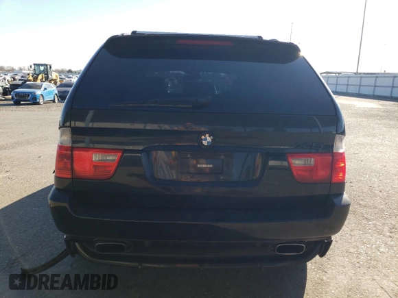 2005 BMW X5 4.8is with VIN 5UXFA93515LE83489, listed as a Copart auction lot 87840265 with 131,786 mi miles and Salvage Title. Bid and sale history available at carsss.com. Image 6.