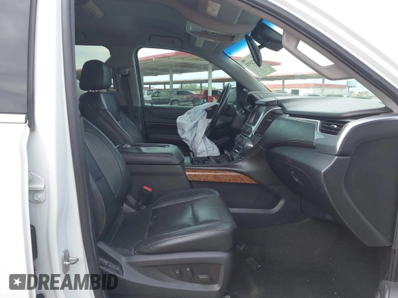 2015 Chevrolet Suburban LTZ with VIN 1GNSKKKC5FR691219, listed as a IAAI auction lot 41921973 with 169,119 mi miles and . Bid and sale history available at DreamBid. Image 5.