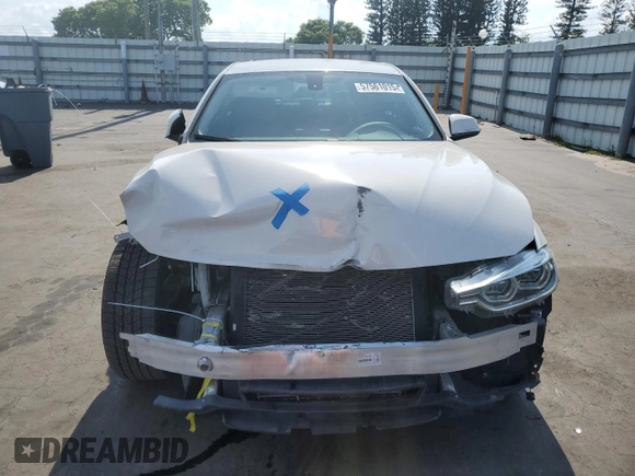 2018 BMW 3 Series 320i xDrive with VIN WBA8A3C55JA357532, listed as a Copart auction lot 57561015 with 46,876 mi miles and Salvage title. Bid and sale history available at DreamBid. Image 5.