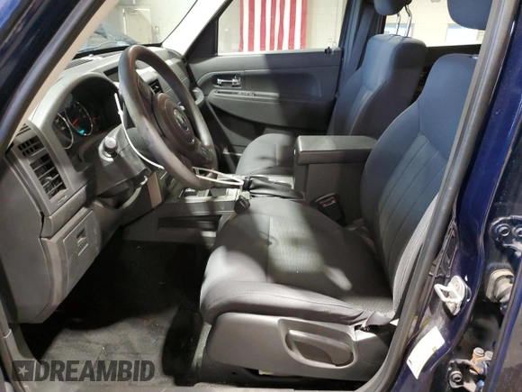2012 Jeep Liberty Sport with VIN 1C4PJMAK1CW129000, listed as a Copart auction lot 49472635 with 77,124 mi miles and Salvage Title. Bid and sale history available at DreamBid. Image 7.