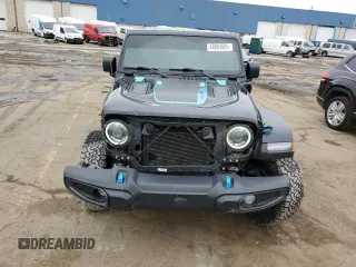 2023 Jeep Wrangler Rubicon z VIN 1C4JJXR63PW566503, wystawiony jako Copart lot #49884605 z przebiegiem 19 304 mil mil oraz Szkoda całkowita • Salvage title. Historia ofert i sprzedaży dostępna na DreamBid. Obrazek 5.
