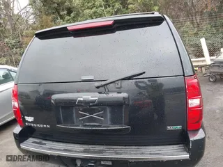 2011 Chevrolet Suburban LTZ with VIN 1GNSCKE02BR206544, listed as a IAAI auction lot 41159341 with 218,202 mi miles. Bid and sale history available at carsss.com. Image 16.