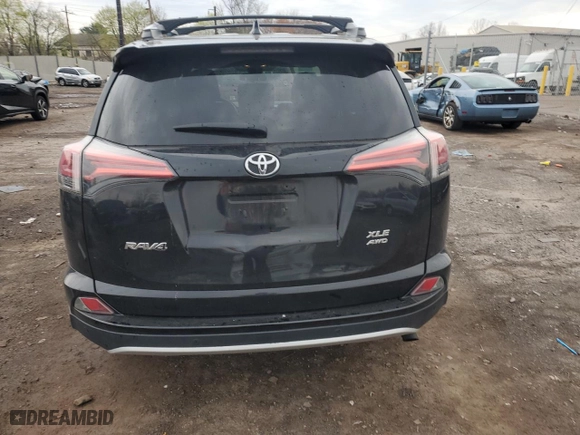2016 Toyota RAV4 XLE with VIN 2T3RFREV0GW528206, listed as a Copart auction lot 53178735 with 131,996 mi miles and Salvage Title. Bid and sale history available at carsss.com. Image 6.