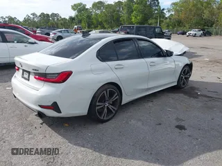2019 BMW 3 Series 330i z VIN 3MW5R1J57K8A03673, wystawiony jako IAAI lot #41672322 z przebiegiem 72 083 mil mil oraz . Historia ofert i sprzedaży dostępna na DreamBid. Obrazek 4.
