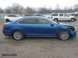 2016 Volkswagen Passat 1.8T SE w/Technology with VIN 1VWBS7A32GC018266, listed as a IAAI auction lot 41425924 with 129,809 mi miles. Bid and sale history available at carsss.com. Image 13.