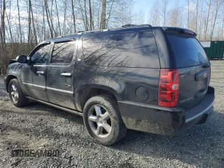 2014 Chevrolet Suburban LTZ with VIN 1GNSCKE08ER230741, listed as a Copart auction lot 47234095 with 184,263 mi miles and Salvage title. Bid and sale history available at DreamBid. Image 2.