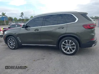 2022 BMW X5 xDrive45e z VIN 5UXTA6C00N9L06383, wystawiony jako IAAI lot #38552162 z przebiegiem 19 592 mil mil oraz . Historia ofert i sprzedaży dostępna na DreamBid. Obrazek 14.