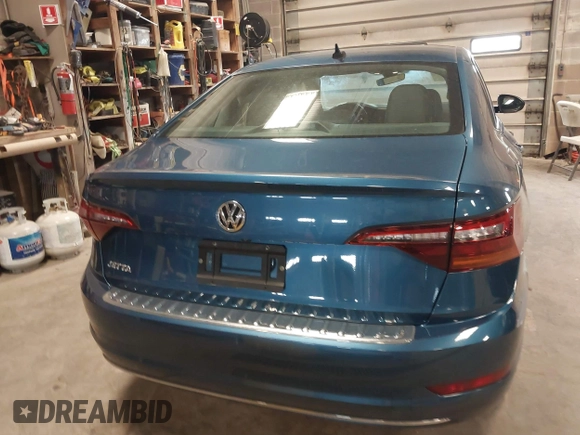 2019 Volkswagen Jetta SEL z VIN 3VWE57BU2KM116717, wystawiony jako IAAI lot #41951428 z przebiegiem 85 791 mil mil oraz . Historia ofert i sprzedaży dostępna na DreamBid. Obrazek 16.