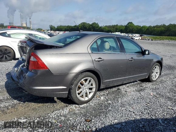 2012 Ford Fusion SEL with VIN 3FAHP0JA7CR387288, listed as a Copart auction lot 56968885 with 169,802 mi miles and Salvage title. Bid and sale history available at DreamBid. Image 3.